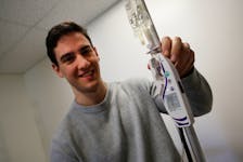 Alex Petropolis shows off a FIVAMed device at Enginuity in Spryfield on Friday.
TIM KROCHAK