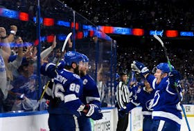 Nikita Kucherov (86) celebrates a goal with teammates Steven Stamkos (91) and Ondrej Palat after scoring on against the New York Rangers during Game 4 of the Eastern Conference final. All three players have spent their entire careers with the Lightning. 