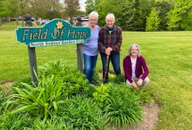 Members of the North Sydney Garden Club, from left, Ann Marie Steele, Ursula Dufour and Dona Benac are looking forward to Garden Day in the CBRM on Saturday. They are pictured here near the Field of Hope in North Sydney. CONTRIBUTED