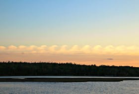 Lee Edgar caught a rare Kelvin-Helmholtz cloud formation at Rainbow Haven Beach. -Contributed