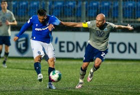 HFX Wanderers' Jeremy Gagnon-Lapare (right) defends against FC Edmonton's Gabriel Bitar during the second half of a Canadian Premier League match Tuesday night at Clarke Stadium in Edmonton. - CANADIAN PREMIER LEAGUE