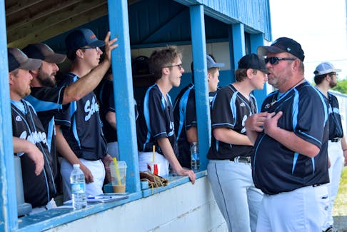 Sherose Island Schooners head coach Bobby Blades talks to the team prior to the start of the June 11 home opener against the Amherst Athletics in the Nova Scotia Intermediate Baseball League. KATHY JOHNSON