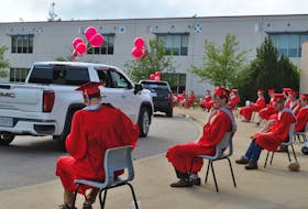 There was a steady stream of vehicles full of well wishers for the community drive-by celebration parade at BMHS in 2021. KATHY JOHNSON