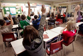 May 24, 2006--Students put up their hands during Ruby Gosse's Grade 6 class at Fairview Heights Elementary in Halifax Wednesday.
(to go with story on reduction of classroom sizes)