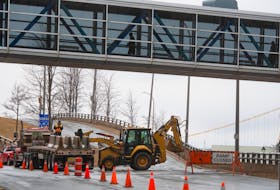 A construction crew works to close off a ramp from Upper Water Street in Halifax on March 15. The closure is part of preparations for construction related to the Cogswell District project.
Ryan Taplin - The Chronicle Herald
