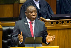 FILE PHOTO: South African President Cyril Ramaphosa delivers his State of the Nation Address at parliament in Cape Town, South Africa, June 20, 2019. REUTERS/Rodger Bosch/Pool via REUTERS/File Photo  South African President Cyril Ramaphosa never reported that his wildlife game farm was burglarized two years ago. The burglars allegedly found $4 million in cash hidden in cushions on his sofa, raising questions about where the cash came from and why it was hidden. REUTERS file photo/Rodger Bosch/Pool via REUTERS