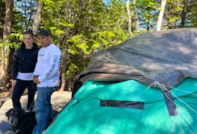 Tremaine Clarke, Amanda Breen and their dog Buddy have called this tent their home since May 20. -Juanita Mercer/SaltWire Network