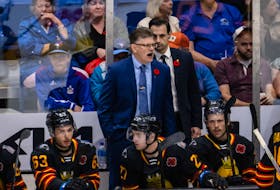 While there are no players from Newfoundland and Labrador taking part in the 2022 Memorial Cup being held in Saint John, New Brunswick this week, the province isn’t without representation. Saint John Sea Dog assistant coach Travis Crickard, shown here next to head coach Gardiner MacDougall, is a St. John’s native. On Monday, the Sea Dogs started their 2022 Memorial Cup with a game the Hamilton Bulldogs vs the Saint John Sea Dogs at the TD Centre in Saint John, NB. Photo by Vincent Ethier/CHL
