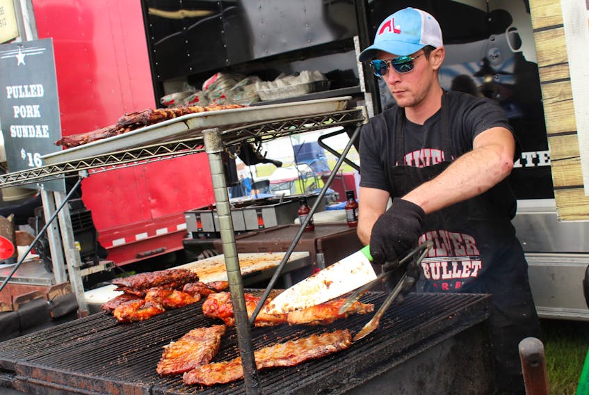 Justin Manseau of Hamilton, Ont., grills up some chicken and pork ribs for a hungry crowd at Rotary Ribfest in Sydney back in 2019. CAPE BRETON POST FILE