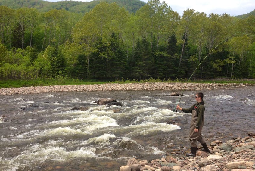 They're all taken on the Margaree river in cape Breton. Old guy is Albert Jenkins, a fishing guide and focus of the column. Young guy is my son Sam DeMont. I took the shots. John Demont photo