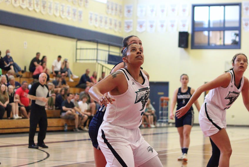 Aylesford’s Jasmine Parent, a forward with the Halifax Hornets, boxes out a Windsor Edge player during Maritime Women’s Basketball Association action June 18 at King’s-Edgehill School in Windsor.