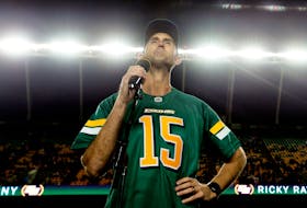 Ricky Ray speaks to the crowd during his Wall of Honour induction ceremony at Commonwealth Stadium on Sept. 20, 2019.