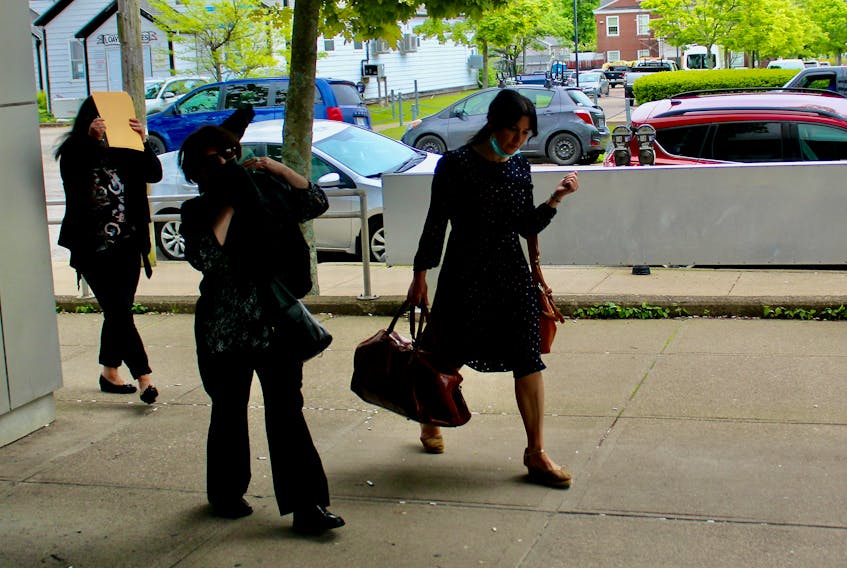 Georgette Young, from left, Lydia Saker, and Angela Macdonald attend Nova Scotia Supreme Court in Sydney on Thursday for the continuation of their sentencing hearing, along with family member Nadia Saker (not shown). The family was found guilty in February of 10 fraud charges and 10 counts of filing false GST claims with the Canada Revenue Agency. Another 10 offences were stayed. CAPE BRETON POST PHOTO
