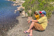 Paul Smith and his grandson may not have landed any fish, but little Cooper’s first time trouting was still perfect. Contributed photo/Goldie Smith