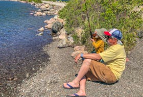 Paul Smith and his grandson may not have landed any fish, but little Cooper’s first time trouting was still perfect. Contributed photo/Goldie Smith