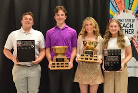 Major winners from Montague Regional High School display their trophies following the school's recent athletic awards presentation. From left are Nathan Nielson, Brodie McCarthy Memorial Award; Sawyer Ryan, male athlete of the year; Kathleen Ryan, female athlete of the year, and Lauren King, Chelsey MacKenzie Spirit Award. Contributed