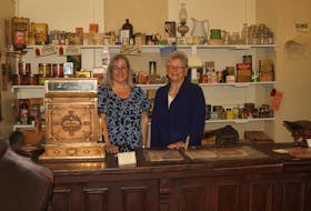 Janice Slauenwhite, left, and Belle Grant-Fairn in the general store at the Annapolis Valley Macdonald Museum in Middleton.