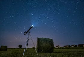 A telescope looking towards the night sky. Simon Delalande - Unsplash