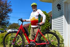 John Dennis of Halifax rode across P.E.I. on his e-bicycle earlier this month as part of his lobbying efforts to get the provincial government to cover an expense drug for people with idiopathic pulmonary fibrosis. He was successful. Dave Stewart • The Guardian