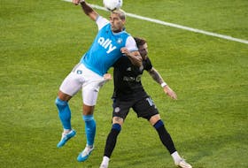 CF Montréal defender Joel Waterman, right, is challenged by Charlotte FC forward Daniel Rios during first half MLS soccer action in Montreal at Saputo Stadium on Saturday, June 25, 2022.