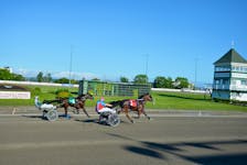 The Mitch Downey-driven Big Time Brawler came on strong to defeat Raging Max and driver Marc Campbell in Race 1 of a 14-dash harness racing card at Red Shores Racetrack and Casino at the Charlottetown Driving Park on June 25. Time of the mile was 1:58.4. Jason Simmonds/The Guardian