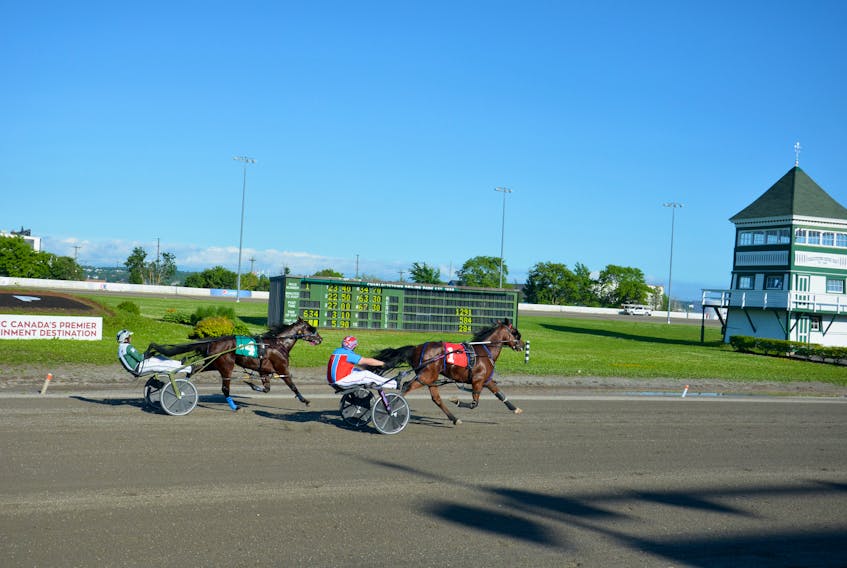 The Mitch Downey-driven Big Time Brawler came on strong to defeat Raging Max and driver Marc Campbell in Race 1 of a 14-dash harness racing card at Red Shores Racetrack and Casino at the Charlottetown Driving Park on June 25. Time of the mile was 1:58.4. Jason Simmonds/The Guardian