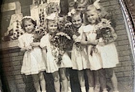 Photo of Westville girls (circa 1946?) prior to laying of flowers at the Westville Cenotaph on July 1st. Pictured from left in front are: Gloria Deagle, Beverley Lambly, unknown and Poldi Morris. Back row: Shirley Fraser and unknown. On July 1st the town will rededicate the cenotaph on the occasion of its 100th anniversary