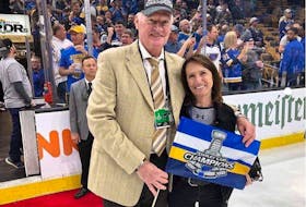 Larry Robinson and his wife, Jeannette, celebrate the St. Louis Blues' Stanley Cup victory in 2019.
