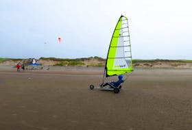 A Blokart, powered by the wind, is sailed across the sand at Mavillette Beach. CONTRIBUTED