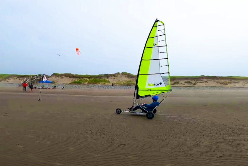 A Blokart, powered by the wind, is sailed across the sand at Mavillette Beach. CONTRIBUTED