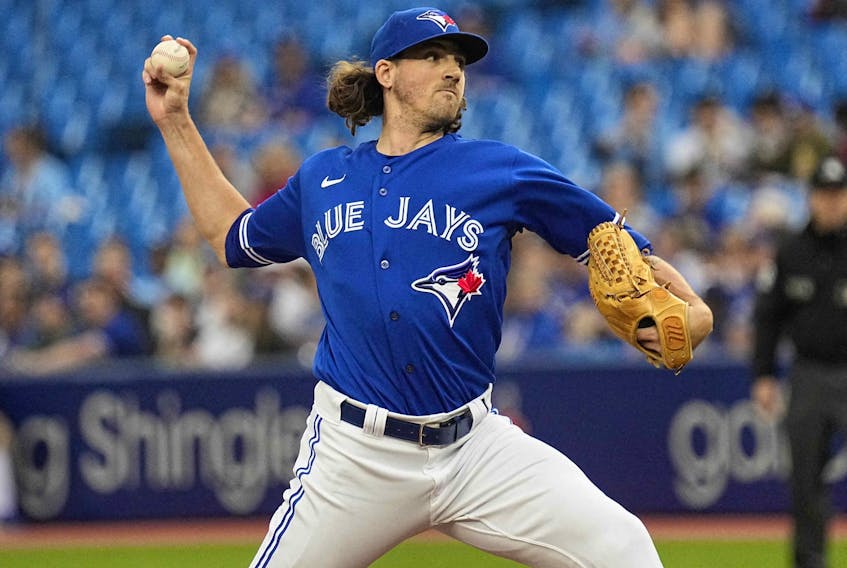 Toronto Blue Jays starter Kevin Gausman (34) pitches to the Boston Red Sox during the first inning at Rogers Centre.