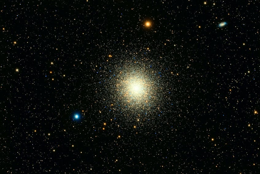 The globular cluster M13 — a group of hundreds of thousands of stars found in the constellation Hercules — can be seen with binoculars and is spectacular even with a small telescope. Guillermo Ferla on Unsplash