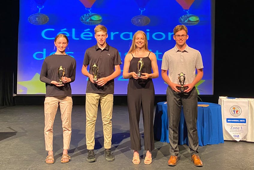 École NDA recently held its annual athletic awards for the 2021-22 School Sport Nova Scotia season. Among the award winners were the Cheticamp school’s athletes of the year. From left, Mya Larade (junior female), Mathieu Delaney (junior male), Claire LeBlanc (senior female), and Stéphane Delaney (senior male). PHOTO CONTRIBUTED/RYAN POIRIER.