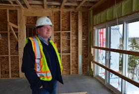 Parsons Green Developments president Noel Taiani looks out over the Cornwallis River valley from the fifth floor of a building under construction in February 2021 as part of the Miners Landing development in Kentville. FILE PHOTO