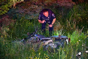 A male motorcycle driver was hospitalized after crashing his bike in Logy Bay early Wednesday morning.