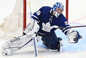 Toronto Maple Leafs goalie Jack Campbell (36) makes a glove save against the Tampa Bay Lightning in game seven of the first round of the 2022 Stanley Cup Playoffs at Scotiabank Arena. 