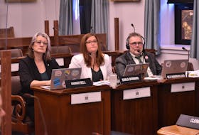 MLAs Hannah Bell, left, Karla Bernard and Ole Hammerlund listen to the presentation at the standing committee on health and social development June 28. Alison Jenkins • The Guardian