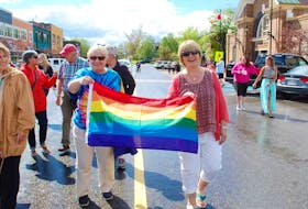 Participants carry a rainbow flag during the Grand Falls-Windsor Pride March in this 2018 file photo.