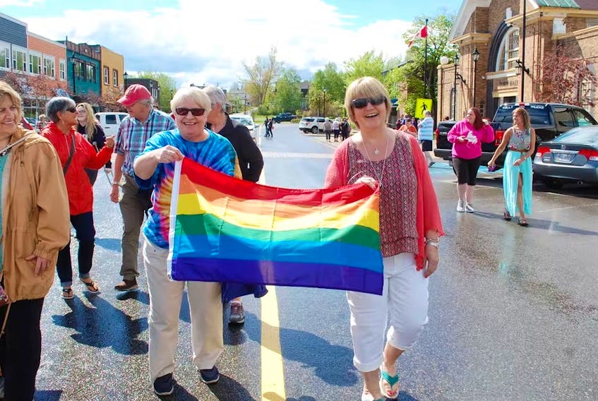 Participants carry a rainbow flag during the Grand Falls-Windsor Pride March in this 2018 file photo.