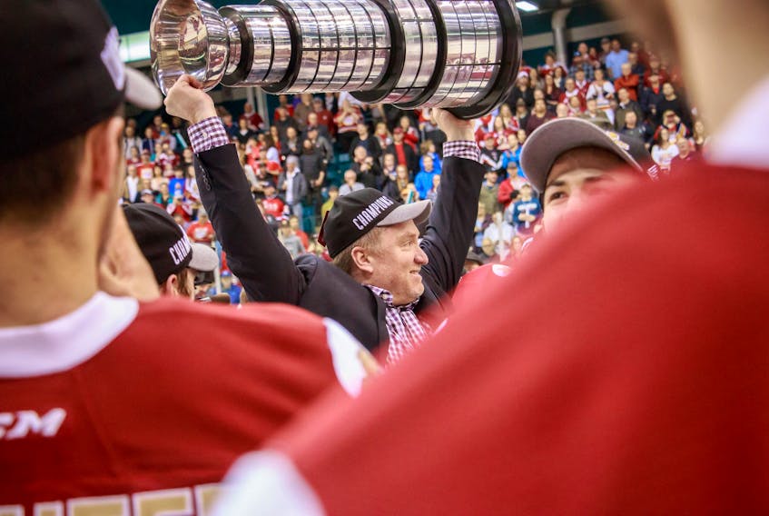 Sylvain Couturier lifts the President Cup over his head as a member of the Acadie-Bathurst Titan in 2018. According to reports, Couturier is expected to be named the new general manager of the Cape Breton Eagles as early as next week. PHOTO CONTRIBUTED/ACADIE-BATHURST TITAN.