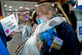 Tanya Poleniuk embraces a member of the local Jehova's Witness community that was waiting for her. Poleniuk was one of over 300 Ukrainian refugees that arrived in the province at Halifax Stanfield Airport Thursday June 2, 2022.
TIM KROCHAK PHOTO