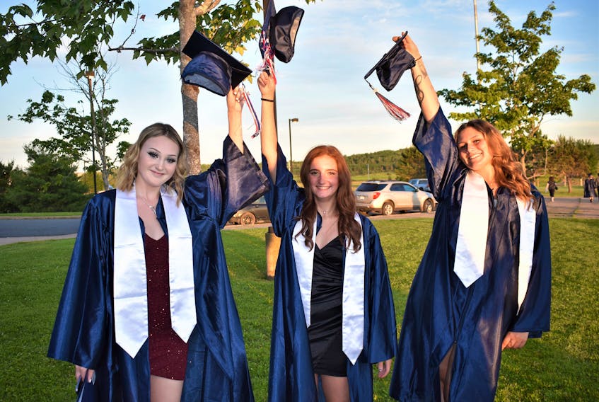 South Colchester Academy grads Brooklyn Shipley (left), Brooke Brown, and Shaylee Brown following the ceremony on June 29. RICHARD MACKENZIE PHOTO