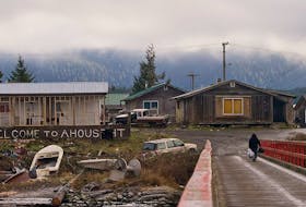 A woman walks in Ahousaht in British Columbia. The National Indigenous Economic Strategy aims to create more opportunities for Indigenous people and their communities. 
