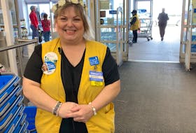 Sue Pitre, who greets customers at Walmart in Charlottetown by singing her favourite songs, is helping raise money for the IWK Health Centre. Dave Stewart • The Guardian