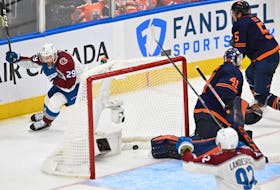 Jun 6, 2022; Edmonton, Alberta, CAN;  Colorado Avalanche forward Nathan MacKinnon (29) scores against Edmonton Oilers goaltender Mike Smith (41) during the third period in game four of the Western Conference Final of the 2022 Stanley Cup Playoffs at Rogers Place. Mandatory Credit: Walter Tychnowicz-USA TODAY Sports  Colorado Avalanche forward Nathan MacKinnon (29) scores against Edmonton Oilers goaltender Mike Smith (41) during the third period of Game 4 of the Western Conference Final of the 2022 Stanley Cup Playoffs at Rogers Place in Edmonton on Monday. - Walter Tychnowicz-USA TODAY Sports