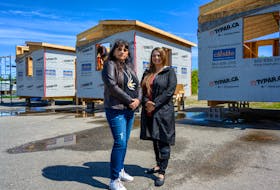 Pam Glode-Desrochers(left), executive director of the Mi'kmaw Native Friendship Centre in Halifax, visits the housing construction site in Lennox Island (off the northwest coast of Prince Edward Island) with Chief Darlene Bernard of the Lennox Island First Nation.