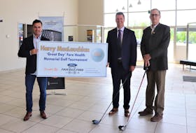 Harry MacLauchlan ‘Great Day’ Fore Health Memorial Golf Tournament co-chairs and Rotarians Jamie Currie (center) and Mike Hennessey (right) visited Shawn McLernan (left), CEO of Fair Isle Ford, the tournament’s presenting sponsor. -Contributed