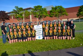 The Three Oaks Axewomen defeated the Bluefield Bobcats 17-5 in the P.E.I. School Athletic Association (PEISAA) Senior AAA Girls Rugby League’s gold-medal game at UPEI in Charlottetown on June 7. Members of the Axewomen are, front row, from left, Kate Campbell, Callie McAlduff, Lana Gillis, Sydney Cameron, Becca Minten, Hannah Somers, Katie Acorn, Shericka Annang, Jessee Hill, Olivia James, Phoebe MacLean and Ami Beaulieu. Back row, from left, are Brent Woodside, Makayla Paznokaitis , Tessa Larose, Sydney Palmer, Aidan Murphy, Lucie Mills, Victoria Thornhill, Paige MacLean, Lindsay Stewart, Sydnee Bernard, Gracie Gallant, Ellie MacLeod, Maddy Dyer, Lauren Clark, Oxanna Campbell, Tim Hockin and Keturah Fraser. Jason Simmonds • The Guardian