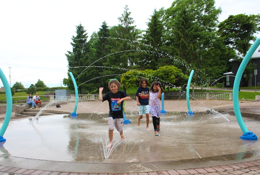 Spending a long weekend visiting relatives in Sydney was the perfect opportunity for these Halifax visitors to try out the splash pad in Wentworth Park. Enjoying the day were Attius McFarlane, 8, his six-year-old sister Rose and their older brother Felix, 10. CAPE BRETON POST PHOTO