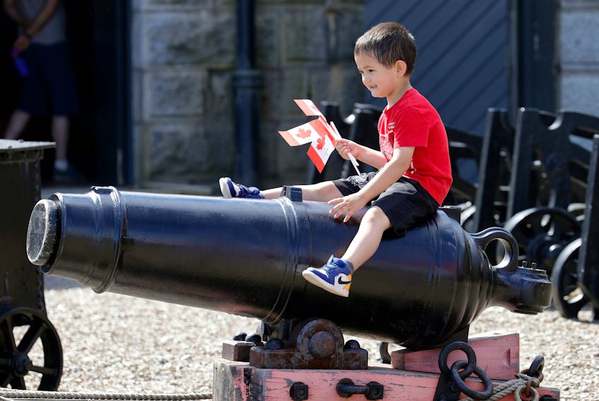 July 1, 2022--Caden MacMillan, 4, sits on top of a cannon as he and his family tour the Citadel Hill fort during Canada Day.
ERIC WYNNE/Chronicle Herald